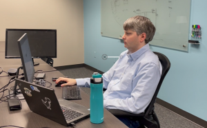 Jamie Eldredge working at computer.